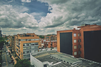 Buildings in city against sky