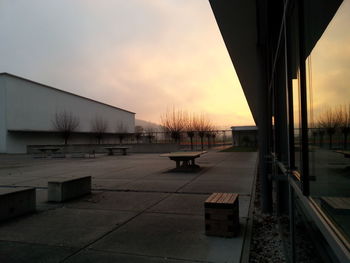 View of built structures against sunset