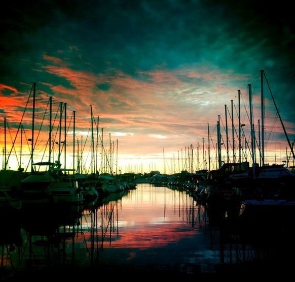 SCENIC VIEW OF SUNSET OVER SEA