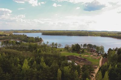 Scenic view of landscape against cloudy sky