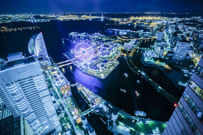 High angle view of illuminated buildings at night