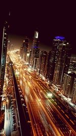 High angle view of light trails on city street