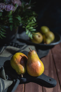 High angle view of pears on rustic wood table