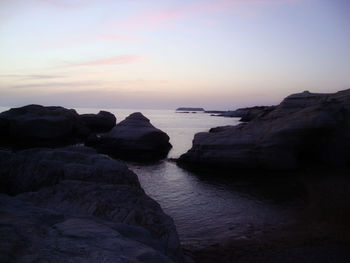 Scenic view of sea at sunset