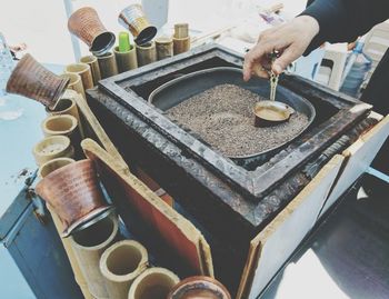 Close-up of man preparing food