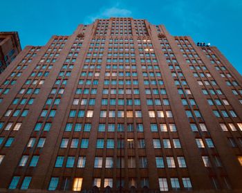 Low angle view of modern building against sky