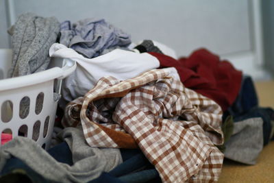 Close-up of shoes on bed at home