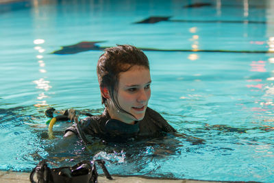 Young woman in swimming pool