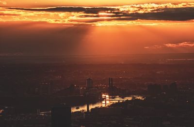 Aerial view of city during sunset