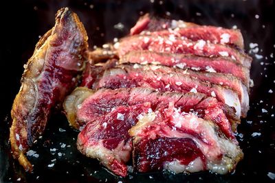 Close-up of meat on barbecue grill