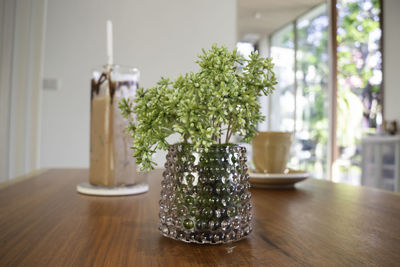 Close-up of vase on table at home