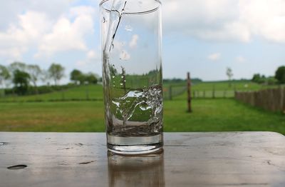 Close-up of glass of water on table