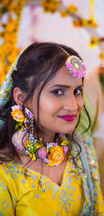 Close-up portrait of smiling bride