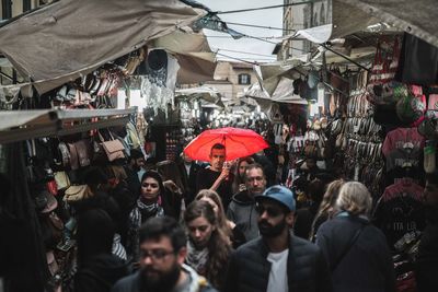 People on street market in city