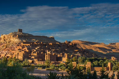 Buildings in city against sky