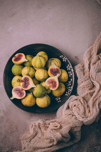 High angle view of fruits in plate on table