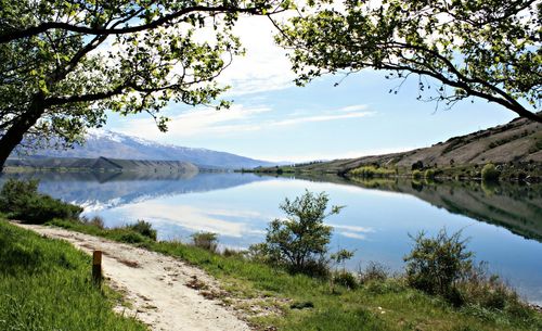 Scenic view of lake and hills