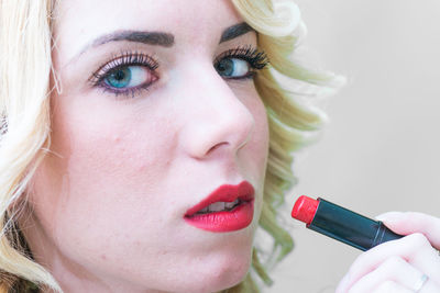 Close-up of woman with tattoo