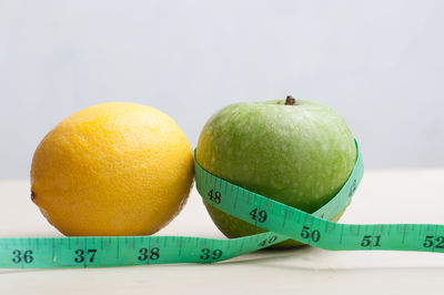 Close-up of fruits against white background