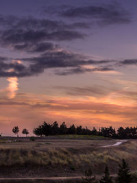 Scenic view of landscape against sky during sunset