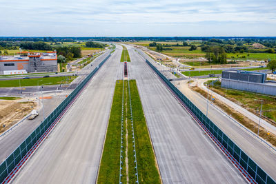 Aerial top view of road construction site. building of new city highway. drone image. new road 