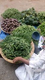 Low section of vendor selling vegetables