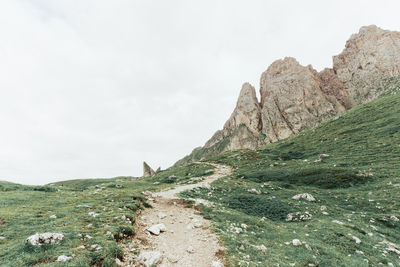 Rock formations on land against sky