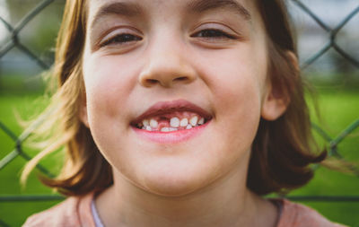 Close-up portrait of smiling girl