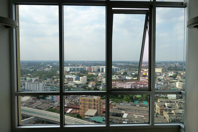Cityscape seen through window