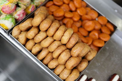 High angle view of indian sweets for sale in market