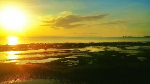 Scenic view of sunset over sea