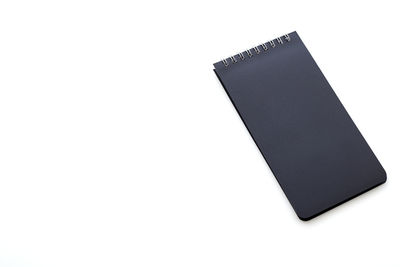 High angle view of empty book against white background