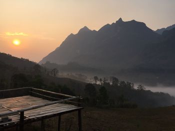 Scenic view of mountains against sky during sunset