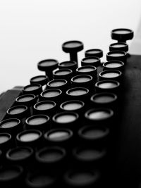 Close-up of piano keys on table