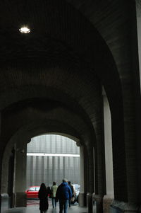 Man standing in tunnel