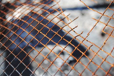 High angle view of rusty broken net