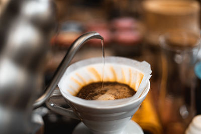 Close-up of cappuccino on table