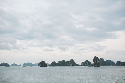 Panoramic view of bay against sky