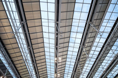 Low angle view of glass ceiling in building