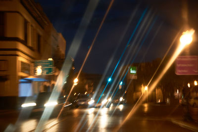 Blurred motion of illuminated city at night