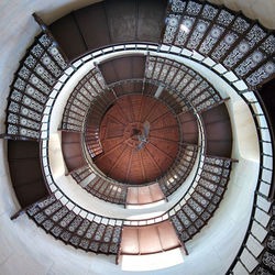 Low angle view of spiral staircase in building