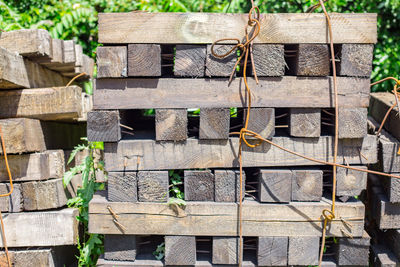 Old wooden pallets. stacks of wooden pallets