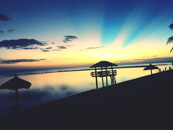 Scenic view of sea at sunset