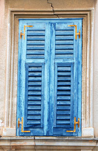 Closed window of old building