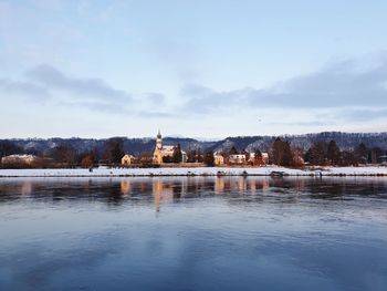 Church at the river elbe in winter