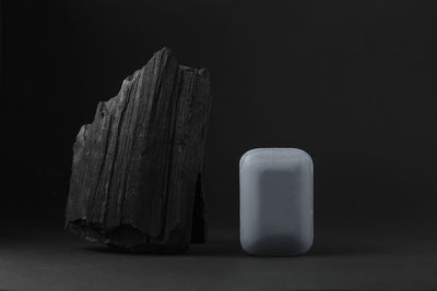 Close-up of food on table against black background