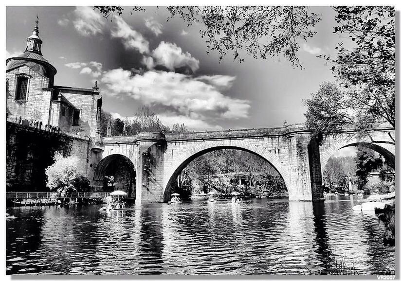 connection, architecture, built structure, bridge - man made structure, water, arch, arch bridge, river, bridge, sky, waterfront, transfer print, tree, building exterior, transportation, auto post production filter, canal, reflection, cloud - sky, engineering