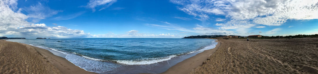 Panoramic view of beach against sky