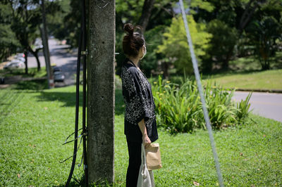 Series photo of young women waiting something in a public park
