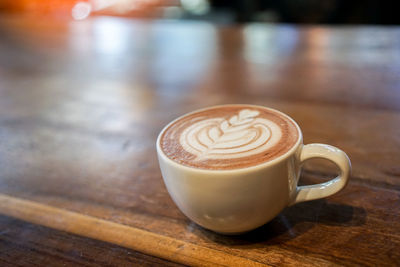 Coffee cup on table